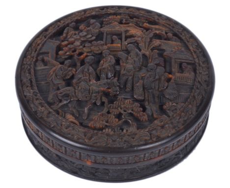 A Small Chinese Tortoiseshell Round Box with Lid:
19th century
Richly decorated throughout with deep carving of figures engag