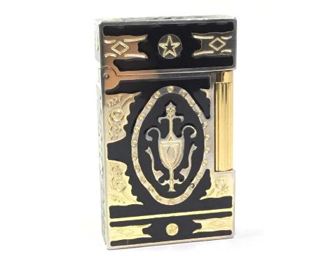 VINTAGE S.T. DUPONT OF PARIS LIGHTER, MID 20TH CENTURY  in gold plate and black enamel, decorated in a Neoclassical style wit