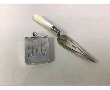 SILVER BOOKMARK, AND A SILVER STAMP BOX the bookmark modelled as a trowel with mother of pearl handle and the stamp box with 