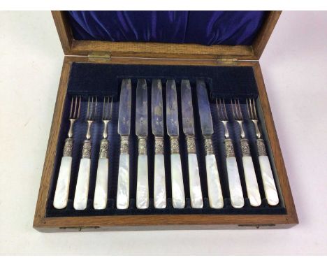 SET OF SIX EACH MOTHER OF PEARL HANDLED SILVER PLATED DESSERT FORKS AND KNIVES, in fitted oak canteen, along with six other s