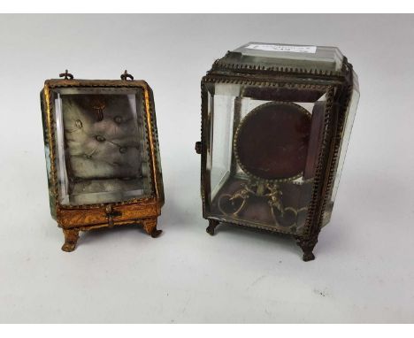 VICTORIAN GILT METAL JEWELLERY CASKET COMMEMORATING THE DIAMOND JUBILEE,  of shaped rectangular form, with a portrait of Quee