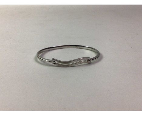 HOT DIAMONDS BANGLE, set with a diamond chip, in silver