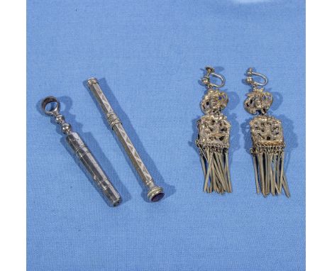 A plated corkscrew, pencil and earrings