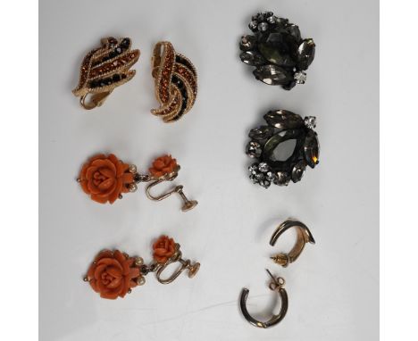 Collection of four vintage earring pairs featuring mixed styles and closures. Includes a pair of gold tone clip-on earrings m