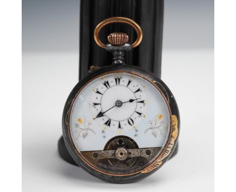 Decorative Swiss-made pocket watch featuring an enameled dial with Roman numerals, visible escapement, and floral inlay in go