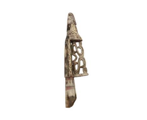 Irian Jaya Papua Central Asmat canoe prow in wood with typical, finely sculpted ornamentation ||PAPOEA - IRIAN JAYA  -  CENTR