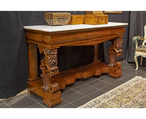 imposing early 19th Cent. Charles X-console in mahogany with typical inlay and with finely sculpted feet with satyr heads  - 