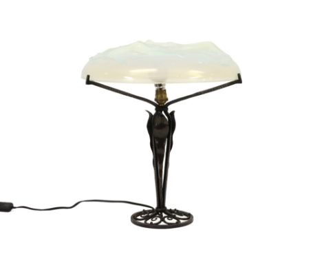 beautiful Art Deco lamp attributed to Sabino with a base in wrought iron and a shade in opalescent glass with a decor with th