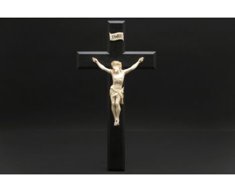 antique Belgian ivory Christ corpus on a crucifix in ebony - marked A. Leroy Bruxelles (on the back) - with CITES certificate