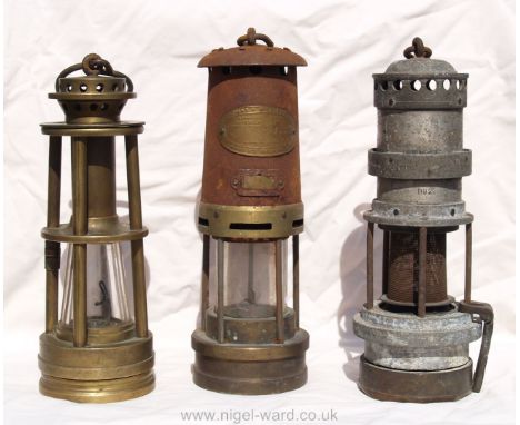 A brass E Thomas &amp; Williams Ltd Aberdare makers miner's Lamp, a rare brass Ashworth Patent Hepplewhite-Gray Davis Derby m