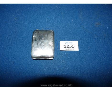 A silver engine turned Card Case 2 1/2" long, hallmarked Birmingham 1930, maker Charles Green &amp; Co.