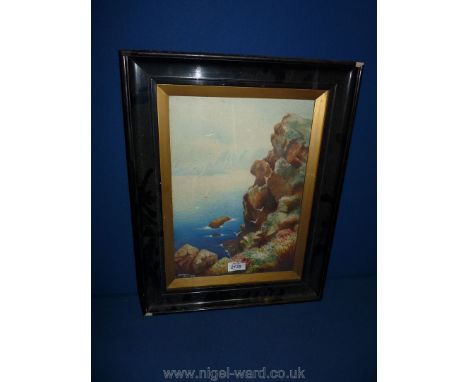 A framed W.W. Watson Watercolour depicting a rocky coastal seascape, dated July 7th 1928.