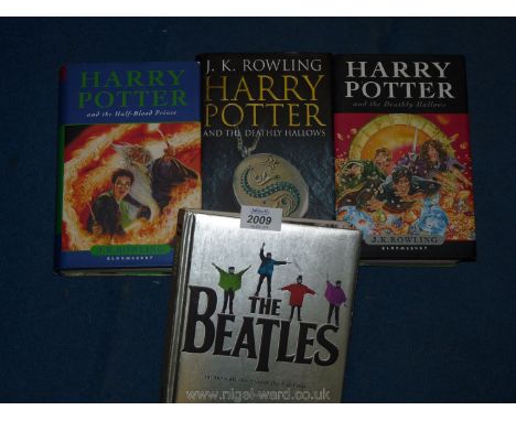 Three first edition Harry Potter books and 'The Beatles'.