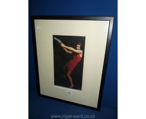 A pop Lithograph of 'Girl with Gun' signed, framed, 17.5" x 21.5", indistinctly signed lower right.