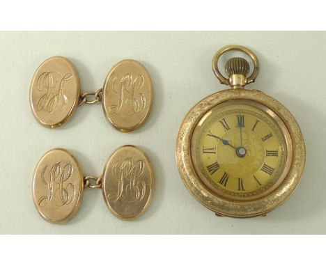 A pair of George VI 15ct gold cufflinks, engraved 'LC', Birmingham 1945, each oval 13 by 18mm, 5.1g, in burgundy presentation