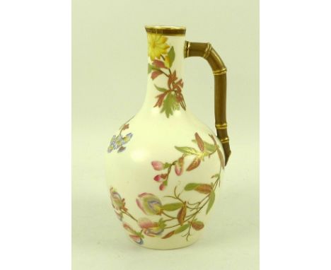 A Victorian Royal Worcester blush ivory jug in the Aesthetic style, with gilded handle, decorated with Japanese prunus flower