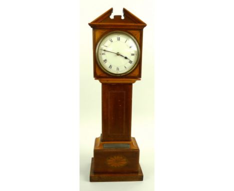 A miniature Edwardian mahogany desktop long case clock, modelled in the Georgian style, decorated with fan paterae, silver pr