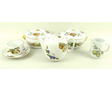 A Royal Worcester part dinner service, decorated in the 'Evesham' pattern, decorated with images of fruit and vegetables, wit