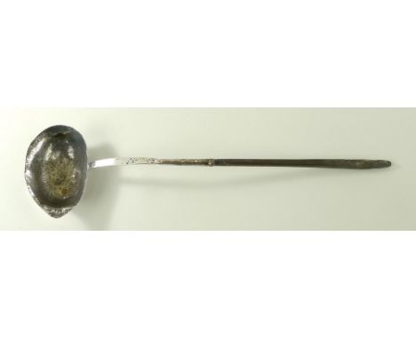 A 19th century plated toddy ladle, possibly Old Sheffield plate, with baleen handle, 28cm long.