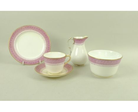 A Royal Worcester part tea service, late 19th century, decorated with pink borders and gilt highlights, comprising two servin