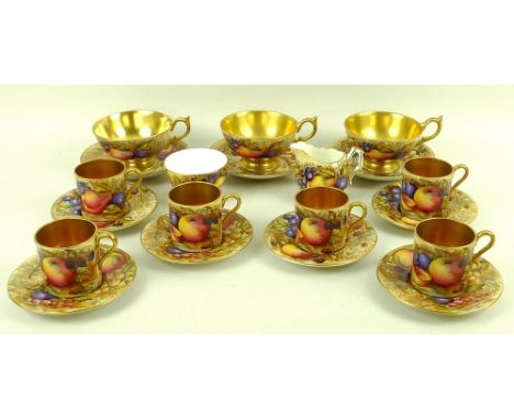 An Aynsley part tea and coffee service in the Autumn Gold pattern, comprising six coffee cans and saucers, three tea cups and