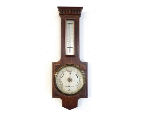 A Negretti & Zambra oak cased barometer, early to mid 20th century, silvered dial marked R/5218, with thermometer above, 16.5