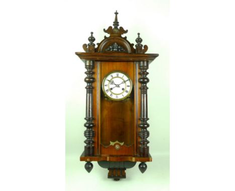 A Vienna wall clock with twin barrel movement, early 20th century, enamel dial and Roman numerals, in glazed mahogany case, w