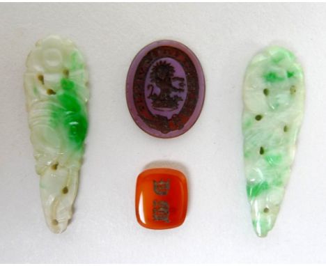 A pair of jade carved and pierced drops, a/f one broken, together with an unmounted intaglio with coronet and lion, and an ag