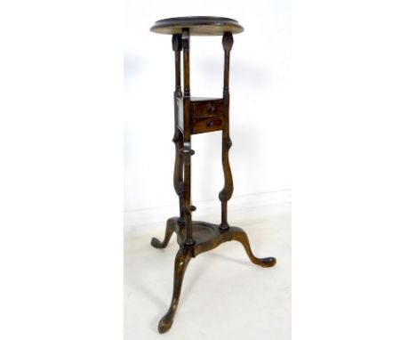 A Georgian style wig stand, with solid top shelf, with mid shelf and two drawers, three cabriole legs, 56 by 56 by 89cm high.