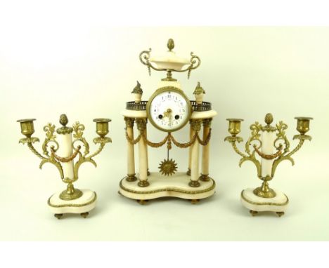 A 19th century French white marble and gilt metal mantel clock garniture, the barrel movement striking on a bell, stamped 'AD