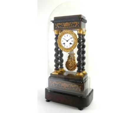 A 19th century ebonised and inlaid portico clock, with white enamel face and black Roman numerals, minute markers, with folia