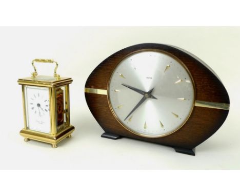 A modern brass plated carriage clock, by David Peterson, England, with Swiss movement, bevelled glass and key, 13cm, together