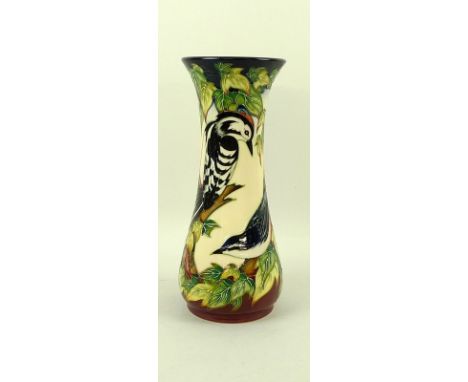 A Moorcroft pottery vase of flared form, tube line decorated with birds, in the Ingleswood pattern designed by Philip Gibson,