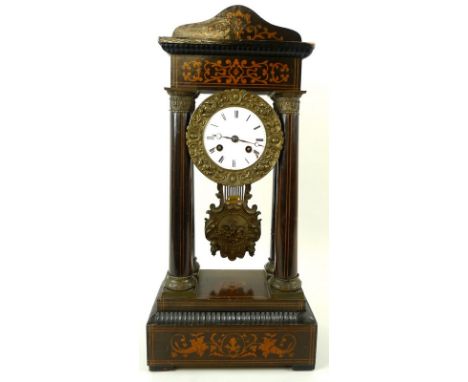 A 19th century ebonised and inlaid portico clock, with white enamel face and black Roman numerals, minute markers, twin train