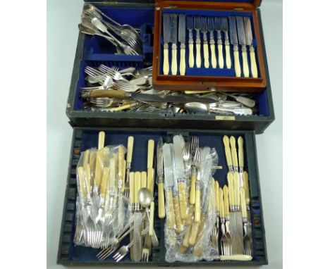 A group of fish knives and forks with silver ferrules and ivory handles, a twelve place canteen of silver plated cutlery, fiv