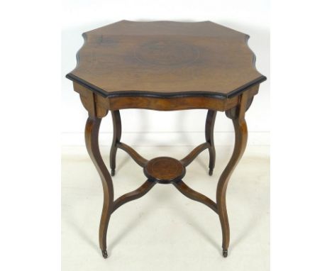 A late Victorian occasional table, figured mahogany and line inlay decoration, central burr walnut inlaid roundel, lower tier