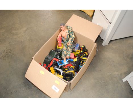 A quantity of various die cast and other model vehicles together with an Action Man figure