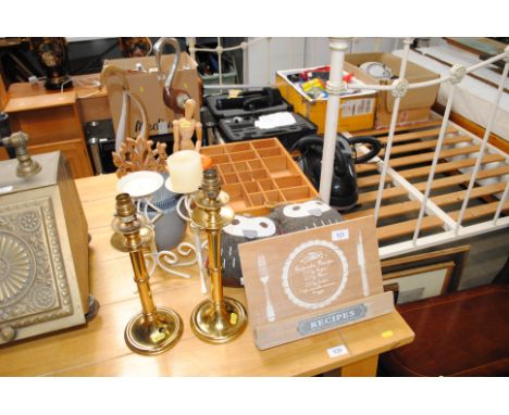 A kitchen recipe stand, a pair of brass table lamps, two candle stands, various ornaments, artists lay doll, wall shelf etc.