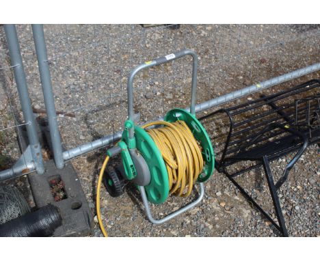 A Hozelock hose reel and length of hose pipe