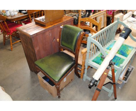 A pine rush seated ladder back elbow chair and a leather upholstered side chair 