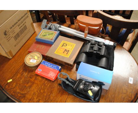 Two pairs of cased binoculars, a Starscope monocular telescope, a Ricoh camera and vintage games