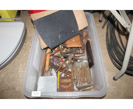 A quantity of leather workers tools to include leather punches etc.