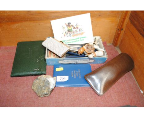 A collection of various pens, Wade Whimsies, coinage, two small sketch books etc.