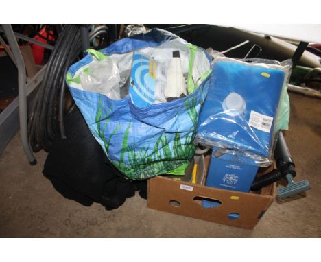 A length of rubber coated steel wire, a H2GO water bag, a Mercedes Benz belt, rear light clusters, a beacon, wire metal baske