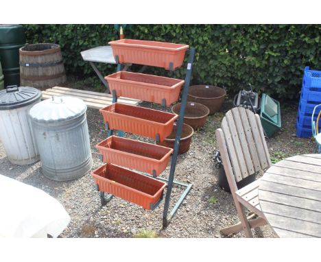 A five tier waterfall style plant trough / stand 