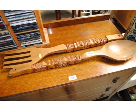 A giant carved wooden fork and spoon