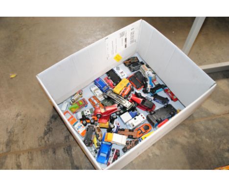 A box of mostly die cast model vehicles