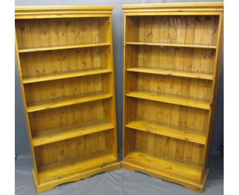 MODERN PINE OPEN BOOKCASES (2) - with adjustable shelving on shaped plinth bases, 166cms H, 88cms W, 32cms max D, 28cms shelf