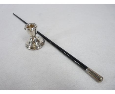 SILVER MOUNTED CONDUCTOR'S BATON and a small squat candlestick, London 1952, maker's stamp 'F D', 45cms L and Birmingham 1921