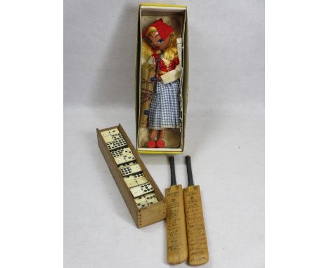 VINTAGE TOYS &amp; GAMES, FOUR ITEMS - a boxed type SS Dutch girl pelham puppet, quantity of bone and ebony dominoes and two 